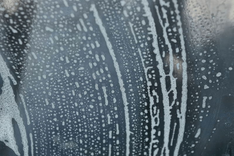 How to Clean Glass Shower Doors and Get Rid of Hard Water Stains and